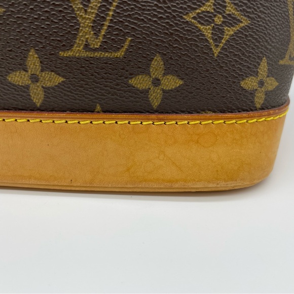 Louis Vuitton Alma Monogram HandBag - Picture 7 of 16